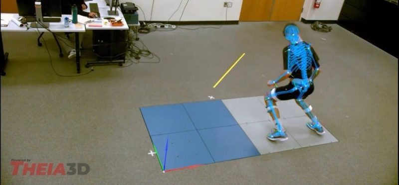 Image of an athlete, with their skeleton overlaid on the image, shuffling on force plates in the Granata Lab. 