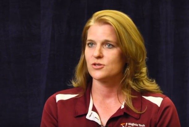 Image of Dr. Robin Queen wearing a marron polo shirt while speaking during an interview.